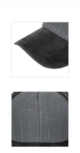 Close-up of washed gray fabric and black mesh texture on a vintage baseball cap