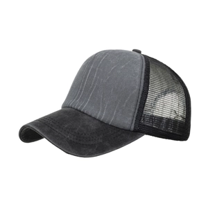 Two-tone washed cotton trucker hat with breathable mesh back and curved brim design