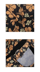 Detailed close-up of hibiscus floral print baseball cap with metal adjustable strap buckle
