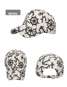 Detailed views of white cotton baseball cap with black anchor and helm nautical prints