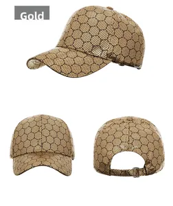 Detail of gold hexagon mesh baseball cap with adjustable metal buckle back view