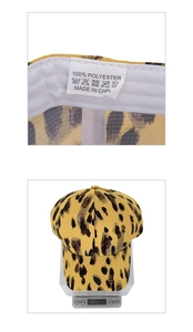 Detail of baseball cap inner label showing 100% polyester fabric and precise stitching