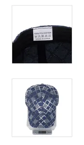 Gros plan d'une casquette à paillettes avec affichage du poids et étiquette lavage