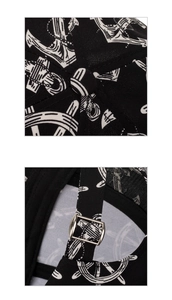 Detail of nautical baseball cap showing metal adjustment buckle and anchor print fabric