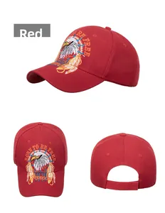 Detail of red baseball cap with eagle embroidery and Born to Be Free slogan stitching