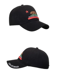 Detail of black baseball cap featuring California Republic bear embroidery and twill fabric