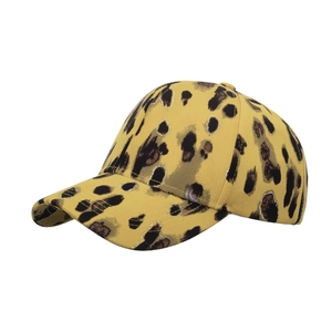 Mustard yellow leopard print baseball cap with glitter spots and curved brim for women