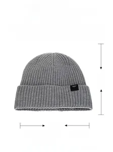 Detail of grey ribbed knit beanie showing dimensions 22x23cm and viscose blend fabric texture