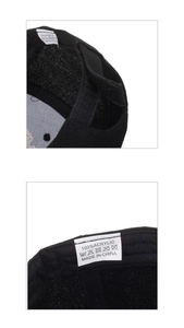Detail of 100% acrylic baseball cap washing label and adjustable velcro strap closure