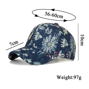 Floral print baseball cap in navy blue with white daisy pattern and size specifications