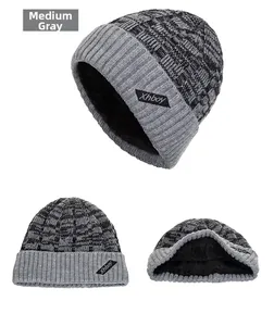 Detail showing heather gray knit exterior and thick black fleece lining of winter beanie