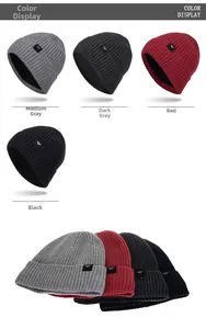 Detail showing knit beanie texture with thick fleece lining and brand logo patch