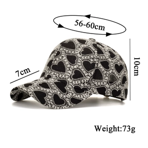 Classic black and white baseball cap with heart embroidery and adjustable strap