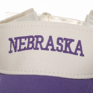 Two-tone Nebraska letter embroidery sun visor hat in cream and purple colors