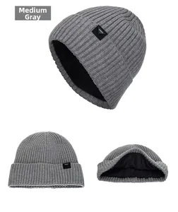 Detail view of heather grey knit beanie with vertical texture and warm fleece lining