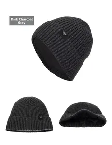 Detailed views of dark heather grey knitted beanie with warm fleece lining and logo patch