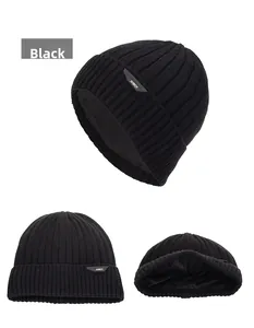 Detail of black knitted beanie showing rib-knit texture and thick warm fleece lining