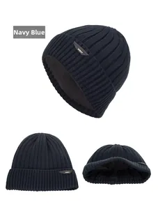 Detailed close-up showing navy blue knit texture and thick black fleece lining for warmth