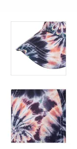 Gros plan d'une casquette tie-dye avec des coutures soignées sur la visière en coton