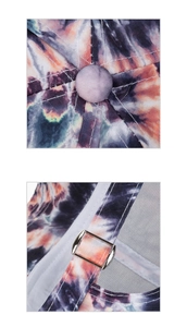 Détail d'une casquette tie-dye avec boucle métallique et bouton supérieur cousu