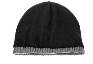 Close-up of black plush winter hat featuring grey ribbed knit cuff and warm fabric