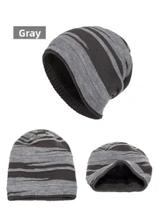 Detail of grey and dark coffee striped knitted beanie with thick black fleece lining