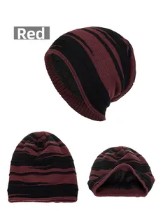 Detail view of red and black striped knit beanie with warm fleece lining and soft texture