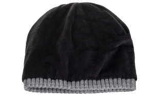 Close-up of black velvet cap body with gray ribbed knit trim for winter warmth