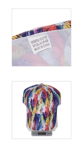 Detail showing the 100% polyester fabric label and weight measurement of the printed cap