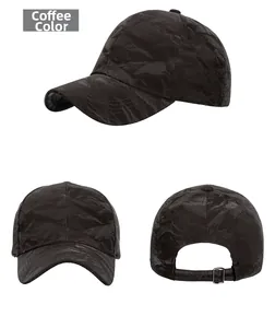 Detailed view of coffee brown baseball cap with wrinkled texture and metal buckle