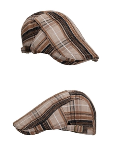 Detail view of vintage checkered flat cap showing adjustable bronze metal side buckle
