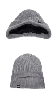 Detail view of winter knit beanie showing thick black fleece lining and grey knit texture