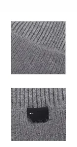 Close-up of dark grey knitted beanie featuring thick ribbing and soft plush lining detail