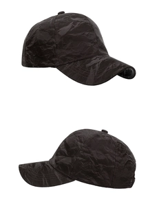 Detail view of the vintage distressed texture and six-panel stitching on this suede baseball cap