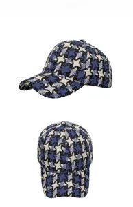 Detailed views of checkered baseball cap with star patterns in blue, black and white