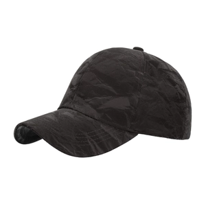 Unisex black faux suede baseball cap featuring unique crinkled texture and paneled design
