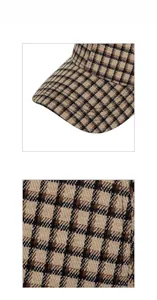 Close-up of the black and brown plaid patterns on the thick tweed baseball cap fabric