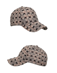 Detailed side view of khaki plaid baseball caps with black bow flocking patterns
