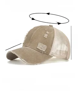 Detailed close-up of khaki mesh trucker hat showing vintage distressed fabric and ventilation