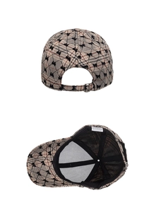 Detail view of adjustable metal buckle and interior mesh lining on the plaid baseball cap