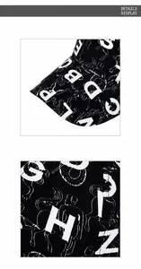 Close-up of beach baseball cap featuring black and white letter print and fabric texture