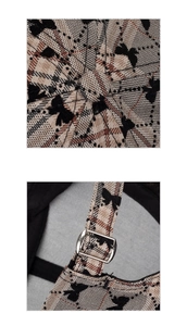 Detail of plaid baseball cap with black butterfly print and silver metal adjustable buckle
