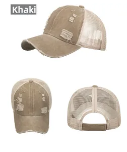 Detail of khaki distressed baseball cap showing vintage wash and mesh panels