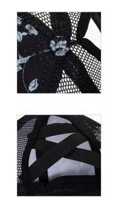 Close-up of black mesh baseball cap with floral print and elastic criss-cross ponytail hole