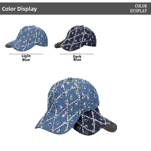 Detail of distressed denim baseball cap with rhinestone patterns and ripped fabric edges
