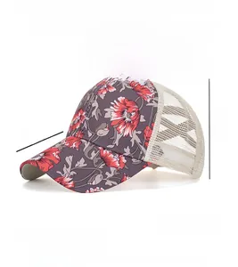 Detail view of floral baseball cap with breathable mesh and elastic criss-cross bands
