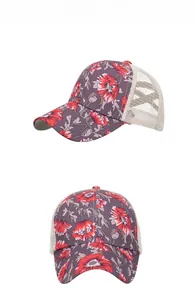 Detailed views of floral print trucker hat with purple brim and cream mesh back panel