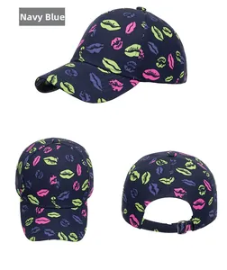 Detailed views of navy blue cotton baseball cap with multi-color lip prints and metal buckle