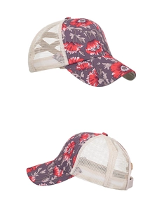 Close-up of floral print mesh trucker hat showing breathable back and adjustable strap