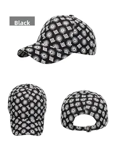 Detailed close-up of a black baseball cap featuring an adjustable metal buckle strap